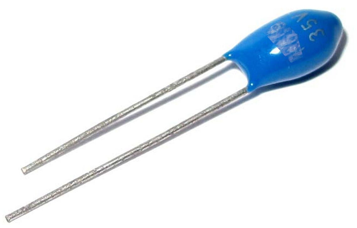 0,1UF 35VT 2,5MM - Capacitors -